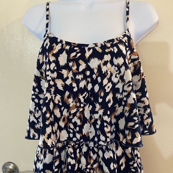 Beautifully designed romper with flowy layers looking like a dress. - Picture 2 of 5
